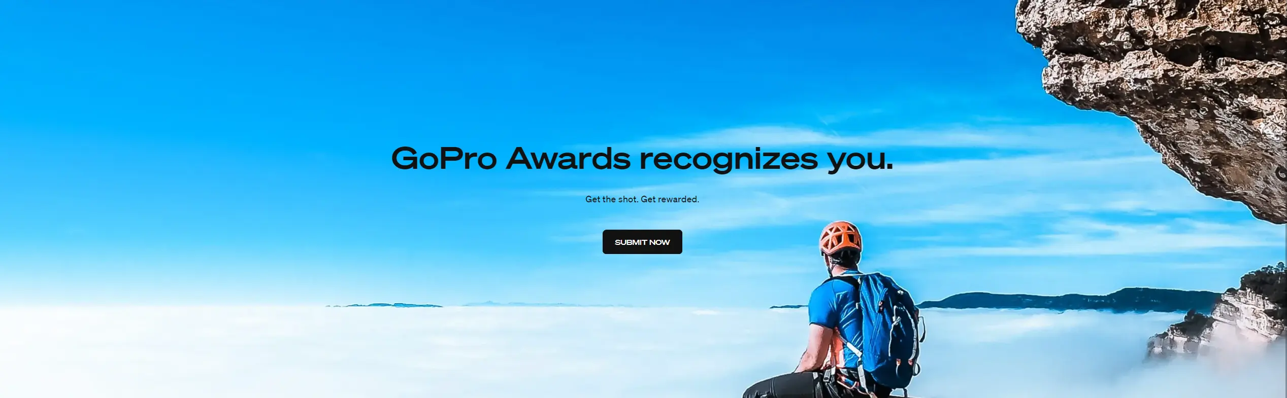 Digtial ad of clouds and the side of a mountain with a hiker sat looking out, alonside the caption "GoPro Awards recognizes you." 