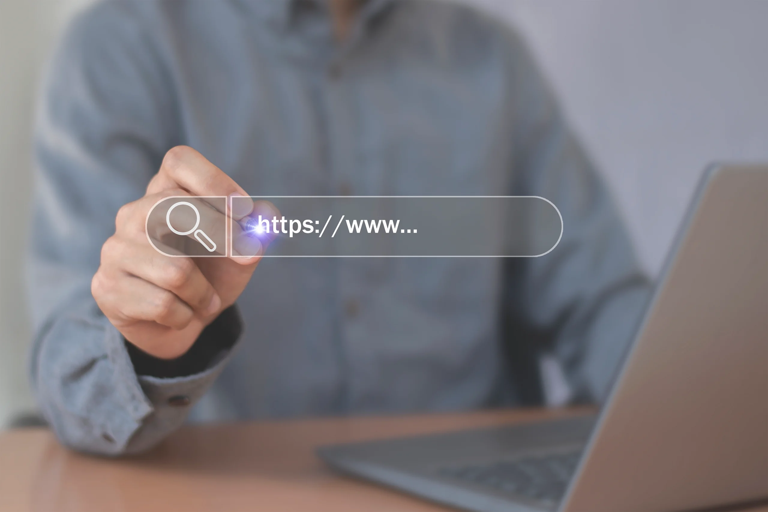 Man using laptop to browse blog and clicking on URl visual graphic 